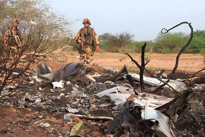 Wreckage is strewn across the ground