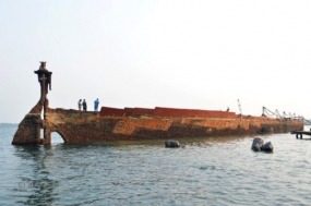 Navy refloats British Navy ship sunk in World War II