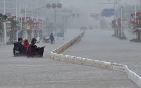 Typhoon Mujigae rips through southern China