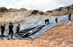 Meetotamulla garbage site covered with polythene