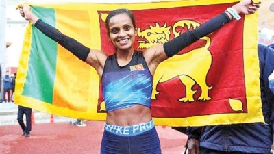 Hiruni climbs marathon’s Everest