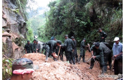 Army troops render assistance to clear upcountry rail line